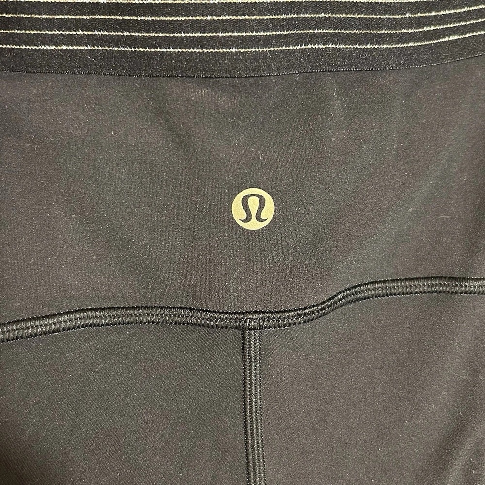 Lululemon Women's Black Stretch Leggings  w/Gold Yoga Pilates Athleisure Sz 10
